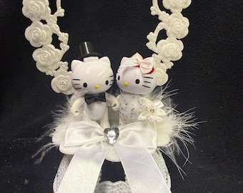 Hello Kitty and Daniel license figures Wedding Cake topper Groom top. So sweet. 6 inches tall, mounted on 4 3/4 wide base.