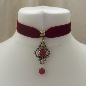 Burgundy velvet ribbon choker, red gem vintage style ornate ancient gold pendant, victorian gothic adjustable collar