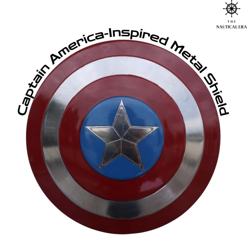 May include: A Captain America-inspired metal shield. The shield features a red outer ring, a silver band, and a blue center with a silver star. The text "Captain America-Inspired Metal Shield" is printed on the shield.