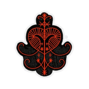 May include: A black and red embroidered patch with a stylized heart design and a floral pattern. The heart is outlined in red and has a series of lines radiating from the center. The floral pattern is also outlined in red and features a series of small stars and crosses.