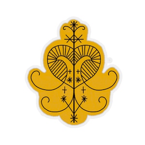 May include: A yellow sticker with a black outline of a heart-shaped symbol with a stylized tree inside. The tree has a star at the top and crosses and stars along the branches.