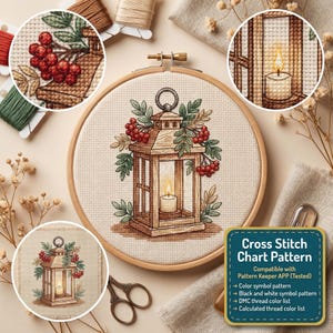 May include: A cross stitch embroidery project in a wooden hoop featuring a lantern with a lit candle, decorated with green leaves and red berries. The design includes a color symbol pattern, black and white symbol pattern, and DMC thread color list.