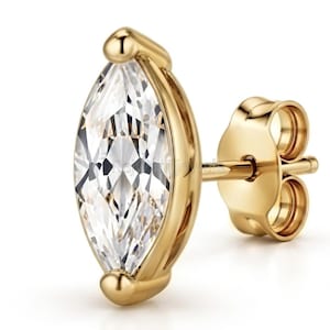 Peut inclure: Une boucle d'oreille à clou en or avec une pierre précieuse transparente taille marquise sertie dans une monture en or jaune poli. La boucle d'oreille comprend une tige en or assortie et un fermoir papillon sécurisé, au design épuré.