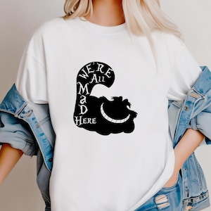 We’re All Mad Here Cheshire Cat Women’s T-Shirt – Alice in Wonderland Tee | White Cotton Shirt | Fantasy Quote Top | Mad Hatter Shirt