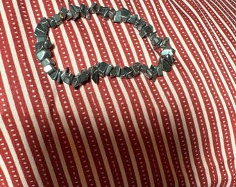 natural hematite chip stone bracelet with a metallic silver-grey sheen