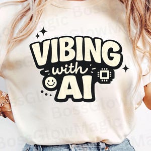 May include: Cream-coloured sweatshirt featuring the text "VIBING with AI" in a black and cream design. The design includes a smiley face and a circuit board graphic. The sweatshirt is a digital file.