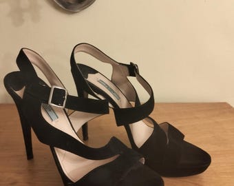 2000s Prada black suede sling back shoe with buckle.  Very good condition.
