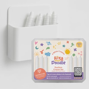 May include: A white plastic holder containing six white crayons, alongside a box of six white crayons. The box is labelled "Arka Doodle Dustless Crayon Set" with colourful illustrations and the text "Ages 3+".
