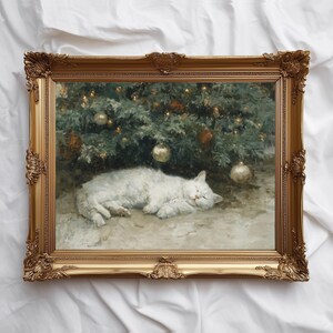May include: A framed painting depicts a white cat sleeping peacefully beneath a Christmas tree adorned with ornaments. The ornate gold frame adds a touch of elegance to the artwork, creating a cozy and festive scene.