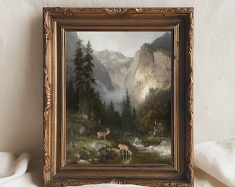 May include: An antique framed landscape painting depicting a mountain valley scene with deer near a stream. The painting features a gold ornate frame. The artwork showcases a serene natural environment with trees, mountains, and a river.