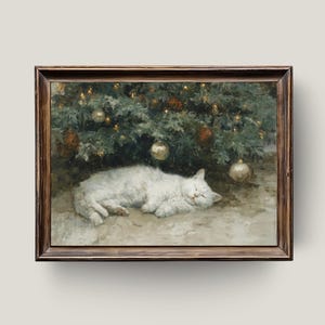 May include: A framed painting depicts a white cat sleeping peacefully beneath a Christmas tree adorned with ornaments. The artwork has a vintage aesthetic, with a warm, inviting color palette. The frame is a dark, rustic wood.