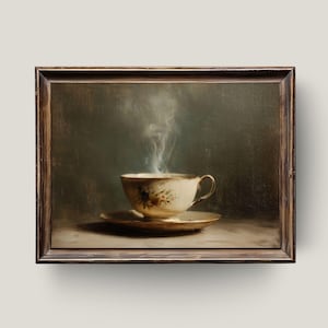 May include: A framed painting depicting a teacup and saucer, with steam rising from the cup. The teacup is cream-coloured with floral designs and a gold handle. The saucer is gold-rimmed. The background is a muted, dark green.