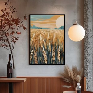 Puede incluir: Una impresión artística enmarcada que representa un campo de trigo bajo un sol poniente. La obra de arte presenta una paleta de colores dorados, azules y naranjas. El campo de trigo está en primer plano, con el sol y el cielo al fondo. La impresión se exhibe en una habitación con una estética moderna.