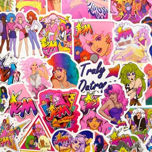 May include: A selection of colourful stickers depicting cartoon illustrations of women with bright hair and fashionable attire. The stickers display diverse poses and designs, with the text "Jem" and "Truly Outrageous" visible.