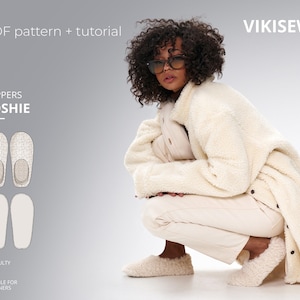 May include: A person wearing cream-colored slippers and a matching coat and pants. The image includes a PDF pattern and tutorial for the "Toshie" slippers, suitable for beginners. The slippers are shown in a diagram and worn by the person.
