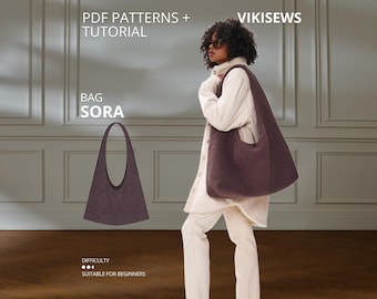 May include: A dark purple, textured, fuzzy hobo-style bag with a single shoulder strap. The image includes text reading PDF PATTERNS + TUTORIAL, VIKISEWS, BAG SORA, and DIFFICULTY. The bag has a curved, wide opening and a tapered base design.