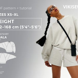 Puede incluir: Un conjunto de sudadera y pantalones cortos de color gris claro. La imagen incluye el texto "PDF pattern + tutorial", "SIZES XS-XL", "HEIGHT 162-168 cm (5'4"-5'6")" y "SWEATSHIRT NUALA". La dificultad es adecuada para principiantes.