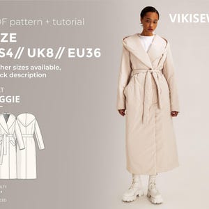 May include: A long, beige coat with a hood and tie belt is modeled. The coat is knee-length and has large pockets. The image also includes a line drawing of the coat and text that reads "COAT REGGIE" and "SIZE US4 // UK8 // EU36".