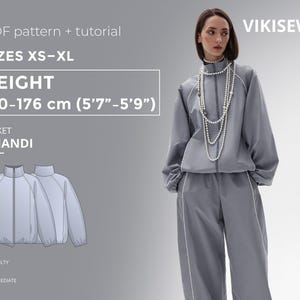 May include: A grey tracksuit with white piping, featuring a zip-up jacket and trousers. The image includes a pattern and tutorial for sizes XS-XL, with a height range of 170-176 cm. The jacket is named KHANDI, and the difficulty level is intermediate.