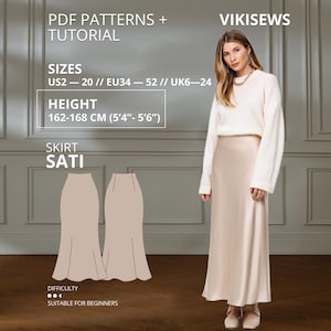 Peut inclure: Un patron de couture PDF et tutoriel pour une jupe nommée Sati par Vikisews. Le patron inclut les tailles US 2-20, EU 34-52 et UK 6-24 pour des hauteurs de 162-168 cm. L'image montre une jupe longue en satin couleur crème et un pull blanc.