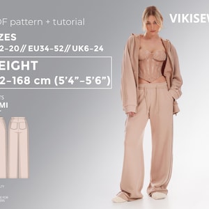 May include: A woman wearing a beige tracksuit, consisting of a zip-up hoodie, a corset top, and wide-leg pants. The image includes text indicating the pattern is for pants, sizes US2-20, and a height of 5'4"-5'6". The brand name "VIKISEWS" is also visible.