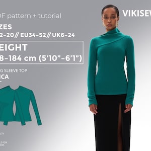 Può includere: Una donna indossa un top a maniche lunghe turchese e una gonna nera. Il top ha uno scollo asimmetrico. L'immagine include testo che indica che il modello è per taglie EU34-52, con un'altezza di 178-184 cm (5'10"-6'1").