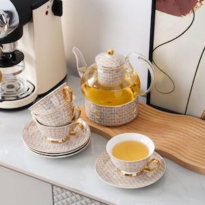 Floral Glass Teapot Set with Ceramic Warmer, Cups & Saucers