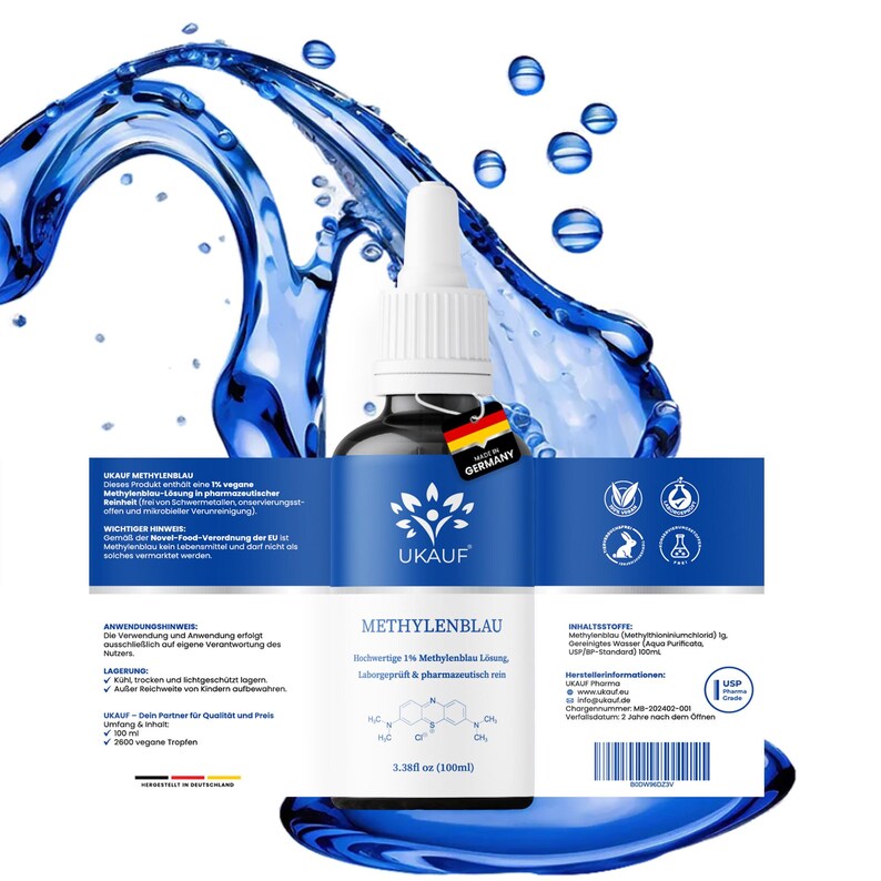 May include: A dark glass bottle with a white dropper and blue label. The label reads "METHYLENBLAU" and "3.38 fl oz (100ml)". The bottle is against a backdrop of blue water splashes. Made in Germany.