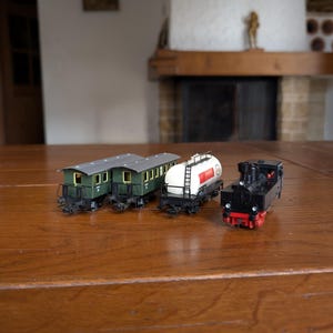 Märklin H0 scale train cars and locomotive 4501 tanker 4040 coaches or 3090 steam engine for model railway collectors