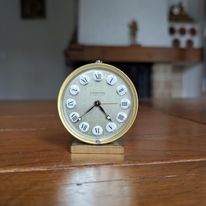 Looping Clock - Etsy