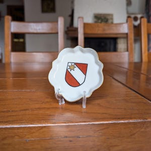 Langenthal 40s Swiss small porcelain plate with embossed bear symbol of the Bern coat of arms for alpine style kitchen or Swiss souvenir