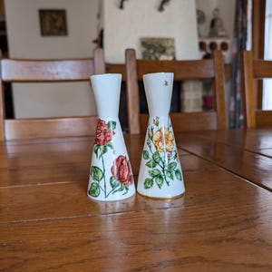 70s Vintage pair of white porcelain candle holders with hand painted flowers for one candle