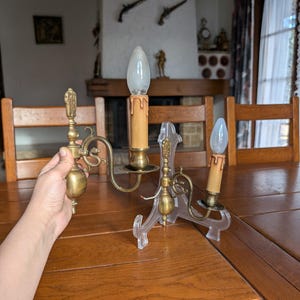 Pair of vintage brass wall mounted single sconces for 70s retro style living room or hallway decor