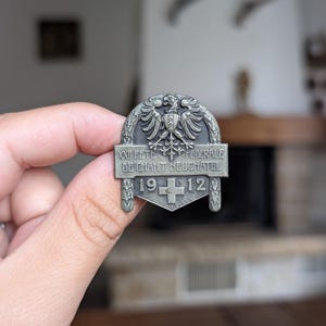 1912 Swiss shooting medal pin from Neuchâtel Huguenin with eagle and Swiss cross vintage collectible badge gift