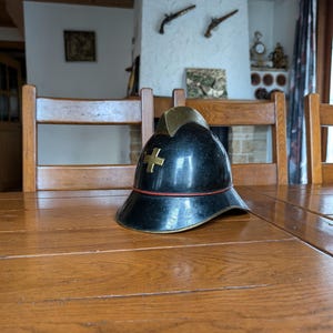 Swiss antique brass firefighter helmet size 57 collectible fireman gift or vintage wall decor