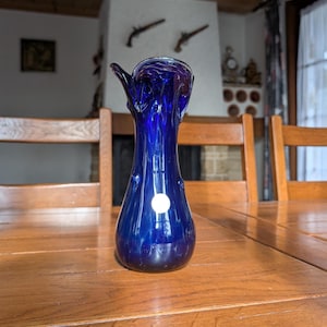 Vintage cobalt blue blown art glass vase with organic flowing shape for spring table decor or artistic centerpiece