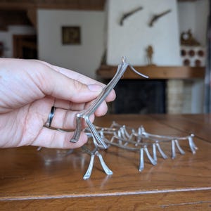 Christofle France vintage 11 silver knife rests set with stylized branch design for elegant French table decor or collectible dining