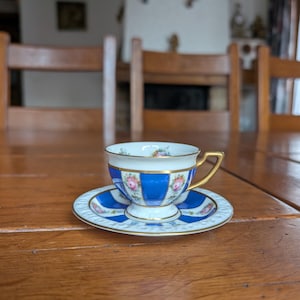 Rosenthal Maria antique fine porcelain mocha duo cup and saucer hand painted with signature, blue and gold colors with pink roses