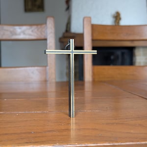 Bronze vintage wall cross with minimalist design and gold inlay a timeless religious decoration from mid-century Germany