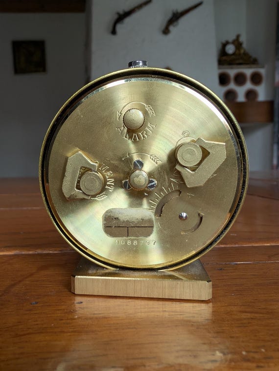 Looping Swiss Brass Travel Alarm Clock: Vintage Miniature Desk