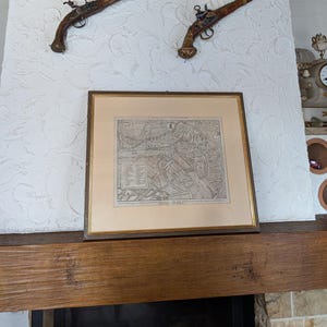 Antique Swiss engraved map of Basel “Cité Tant Renommée” with detailed city layout for historians or cartography collectors