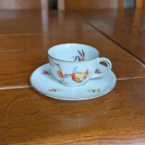 Bavaria vintage porcelain tea cup and saucer set with floral motif and gold trim from West Germany for elegant table setting
