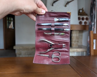 Vintage Solingen manicure set in burgundy leather case German stainless steel grooming tools