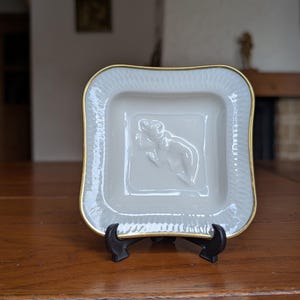 Langenthal swiss porcelain square dish with embossed Bern canton Bear motif and gold rim from Switzerland as swiss souvenir decor