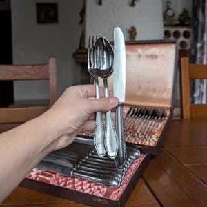 Wirths Solingen vintage 60s stainless steel cutlery set for 12 persons with knife fork and spoon from Germany collectible tableware