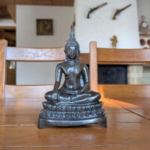 Bronze Buddha statuette in meditation pose with fine detailing for spiritual altar or collectible Buddhist decor