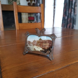 Antique photo of Berlin in a metal frame in mixed style photography and paint