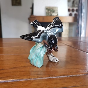 Goebel 60s porcelain bullfinch figurine on a branch mid-century bird decor from West Germany for nature lover shelf display