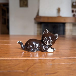 Swiss ceramic black cat figurine with glossy glaze for feline collector or vintage shelf decor