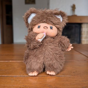 Toho Vintage Monchhichi plush doll from Japan 1970s collectible soft toy in bear suit